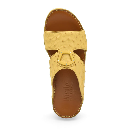 Top view of yellow ostrich leather sandals with brown footbed from Private collection