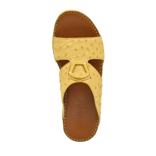 Top view of yellow ostrich leather sandals with brown footbed from Private collection
