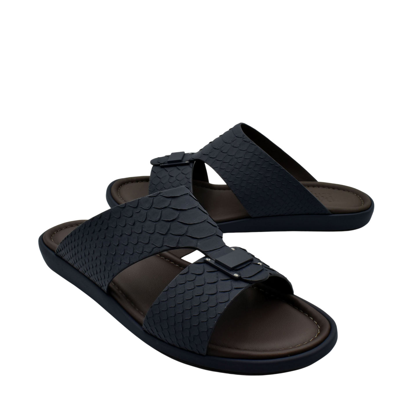 Black python skin footwear slides with textured straps and adjustable buckles for comfortable wear