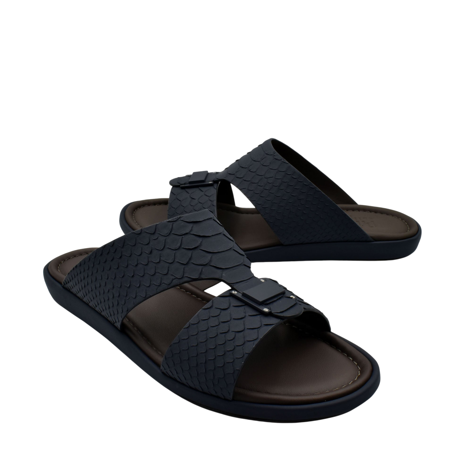 Black python skin footwear slides with textured straps and adjustable buckles for comfortable wear