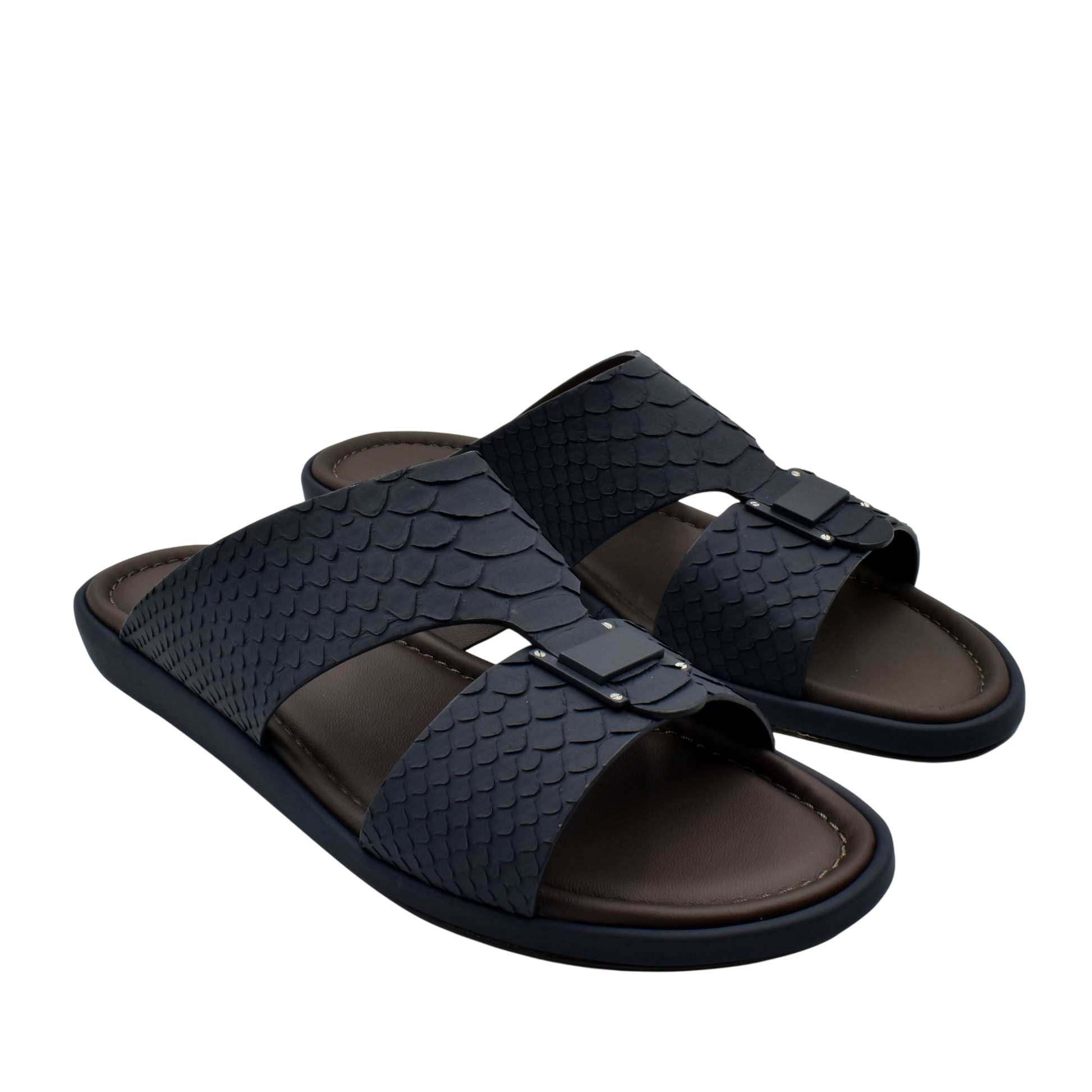 Black python skin footwear slides with textured straps and comfortable brown footbed