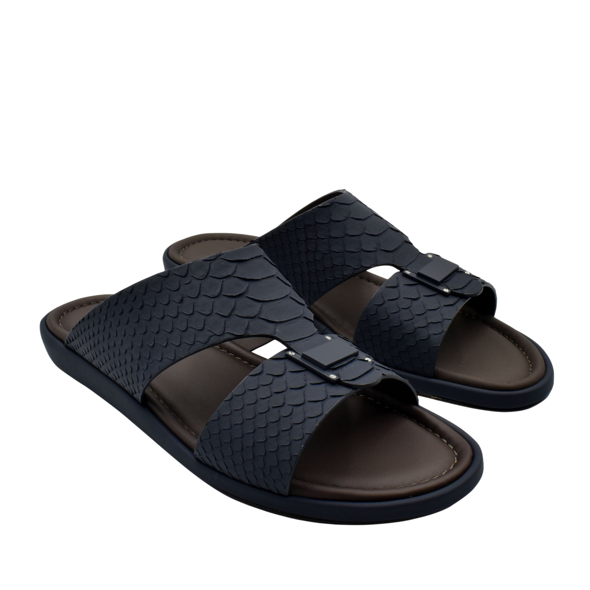 Black python skin footwear slides with textured straps and comfortable brown footbed