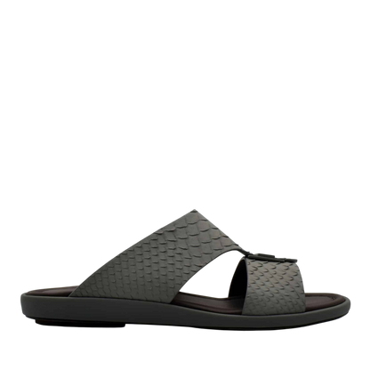 Black slide sandal with textured python skin footwear upper and cushioned sole from private collection