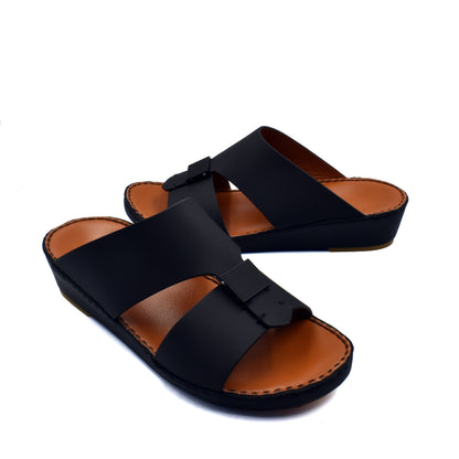 Black leather Quadratura Gomato sandals with wide straps and cushioned brown footbed