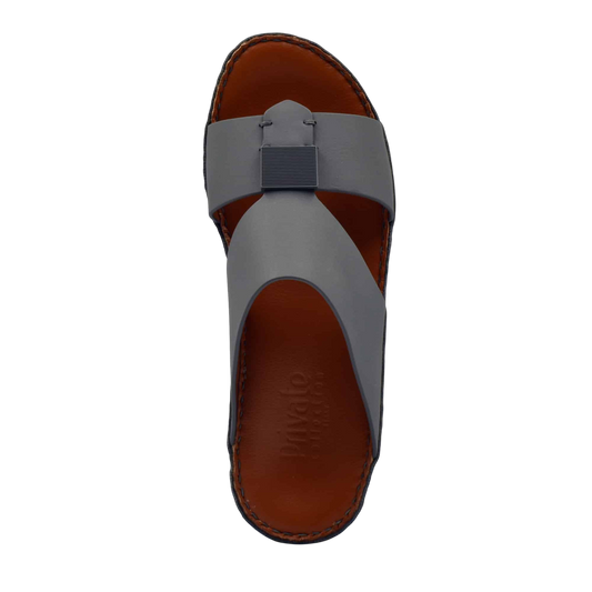 Top view of gray Quadratura Gomato sandals with brown footbed and black stitched sole