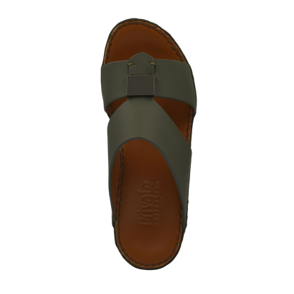 Top view of green Quadratura Gomato sandals with brown footbed and crisscross straps