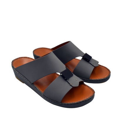 Black Quadratura Gomato slides with wide straps and brown cushioned footbed for comfortable wear