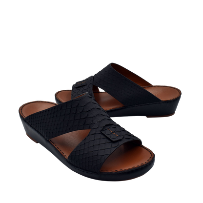 Black rubber python shoes with textured pattern and open toe design from Private collection