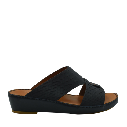Black slip-on rubber python shoes with textured pattern and cushioned wedge sole