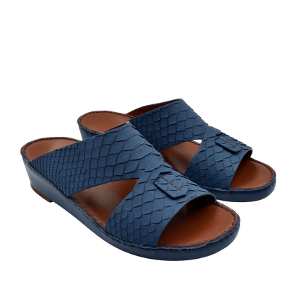Blue rubber python shoes with textured scale pattern and brown cushioned footbed slip-on design
