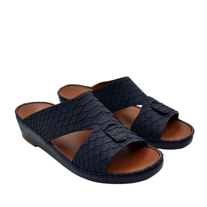 Black rubber python shoes with open toe design and textured scale pattern from Private collection