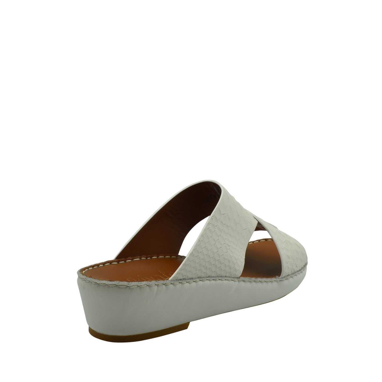 White slip-on rubber python shoes with a low wedge heel and textured upper from Private Collection