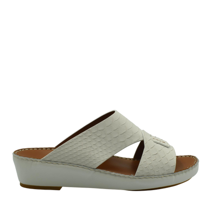 White slip-on sandals with textured pattern resembling python skin from private collection rubber python shoes