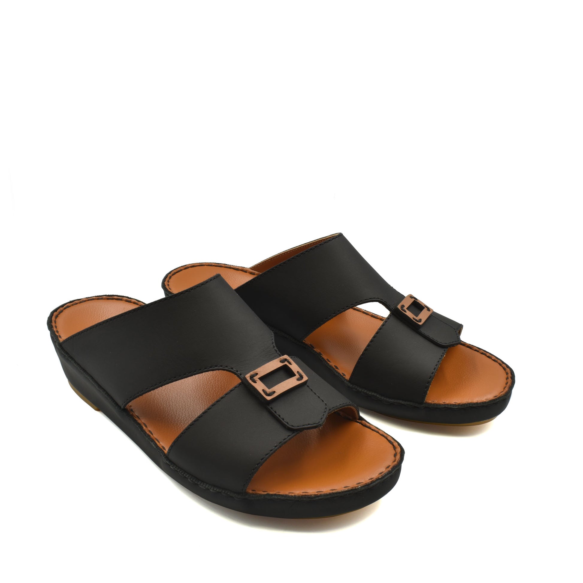 Black rubbercalf contrast sandals with brown cushioned footbed and adjustable buckle straps