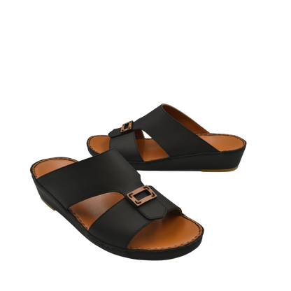 Black leather rubbercalf contrast sandals with adjustable buckles and cushioned brown footbed