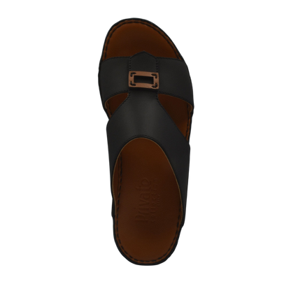 Black rubbercalf contrast sandals with buckle detail and brown cushioned footbed in private collection