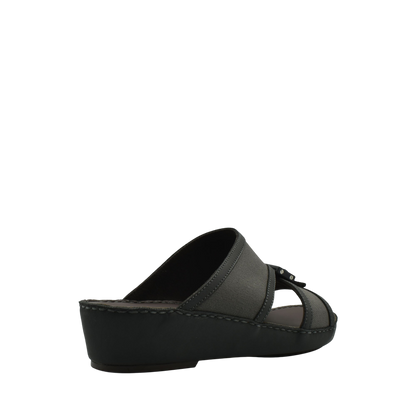 Black softcalf comfort slip on sandals with a low wedge heel and open toe design