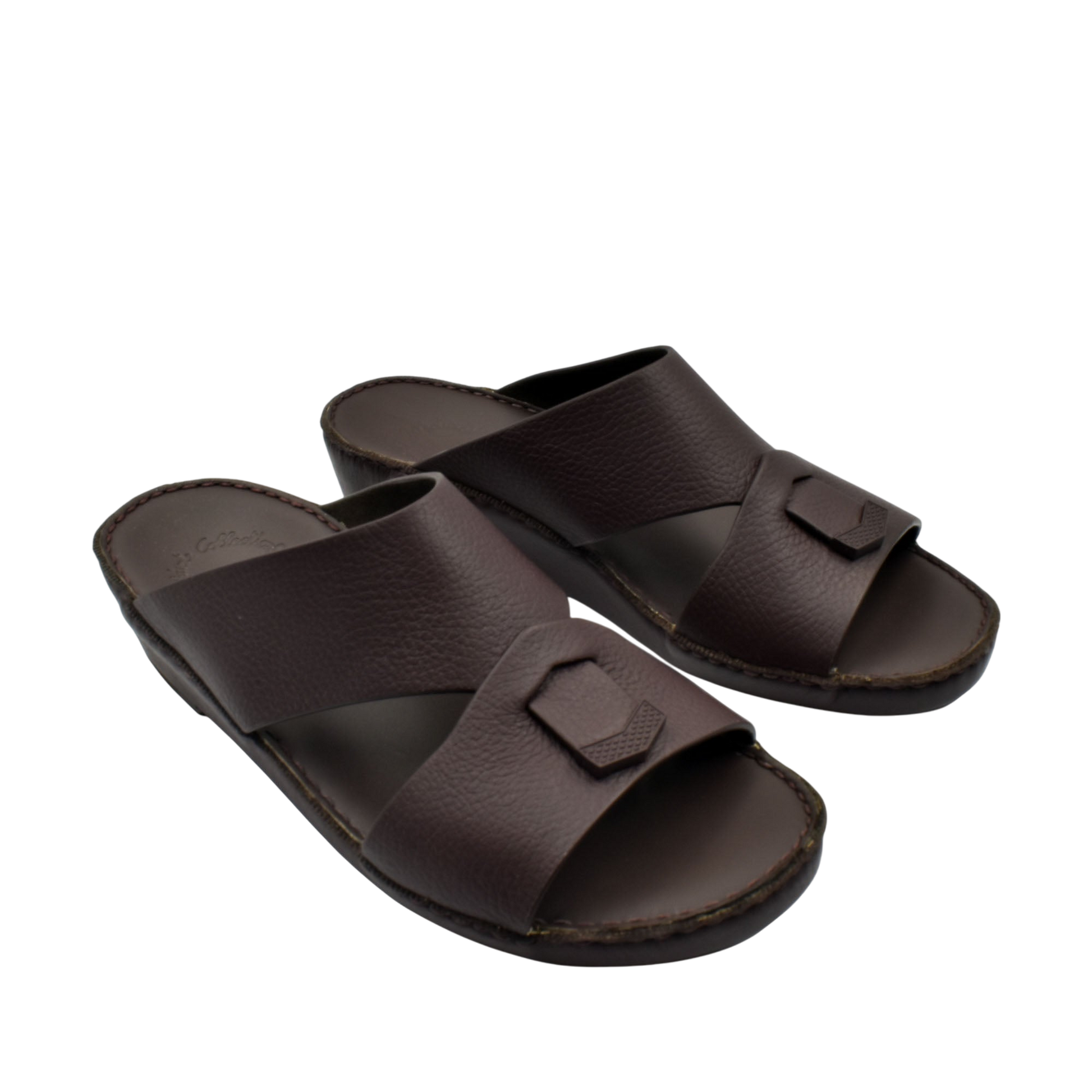 Trendy leather slide sandals in dark brown with a wide strap and decorative buckle detail
