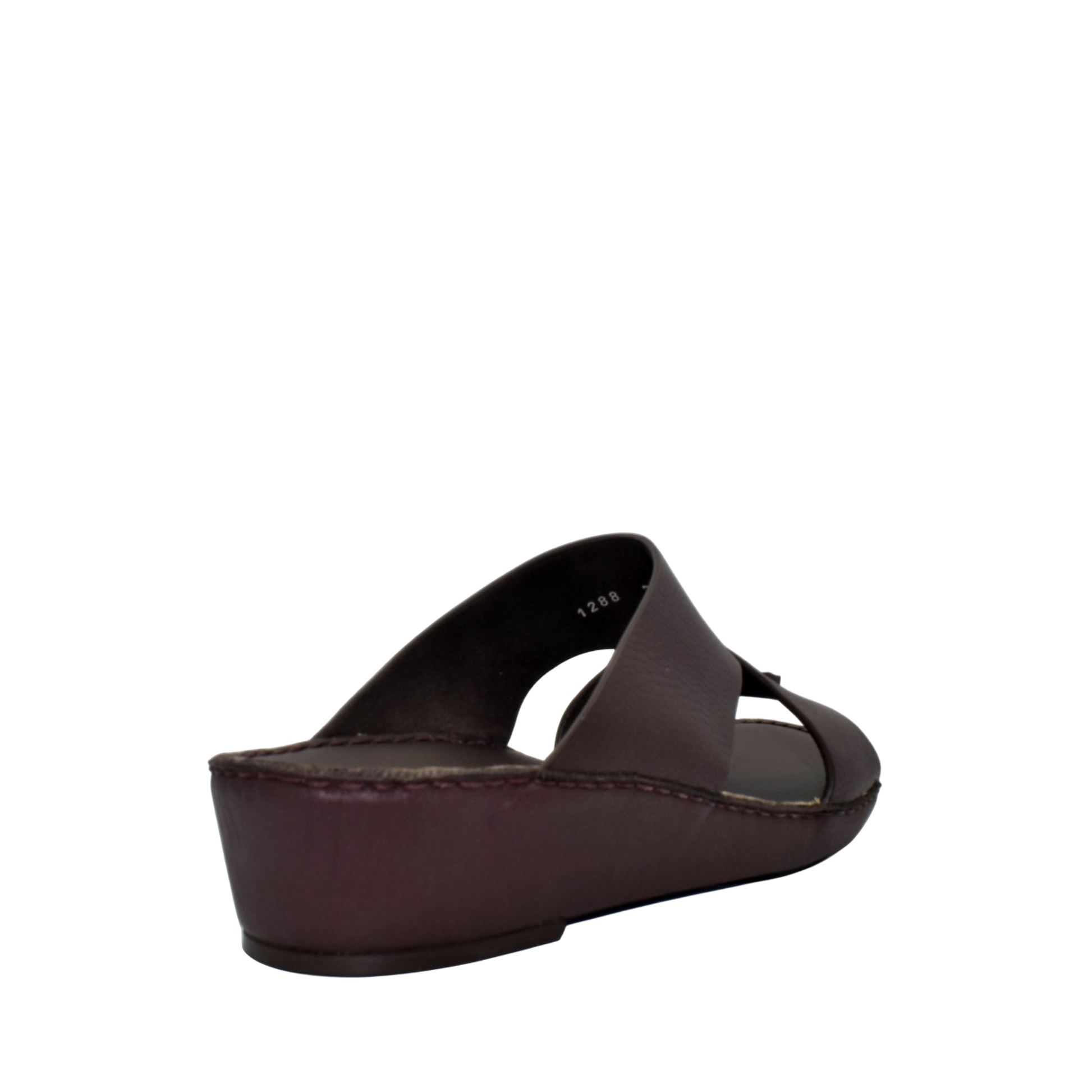 Brown trendy leather slide sandals with cushioned sole from Private collection
