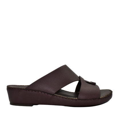 Brown trendy leather slide sandals with cushioned sole and open-toe design from Private collection