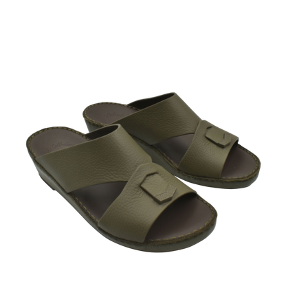 Trendy leather slide sandals in olive green with wide straps and buckle detail for casual wear