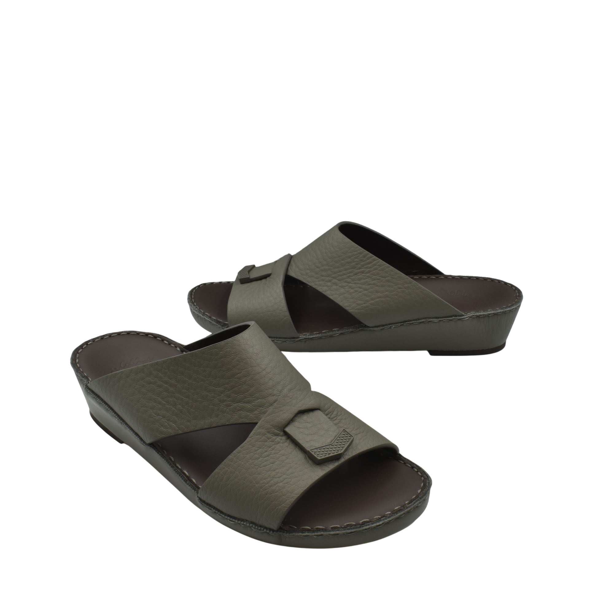 Trendy leather slide sandals in dark olive with a wide strap and decorative buckle detail