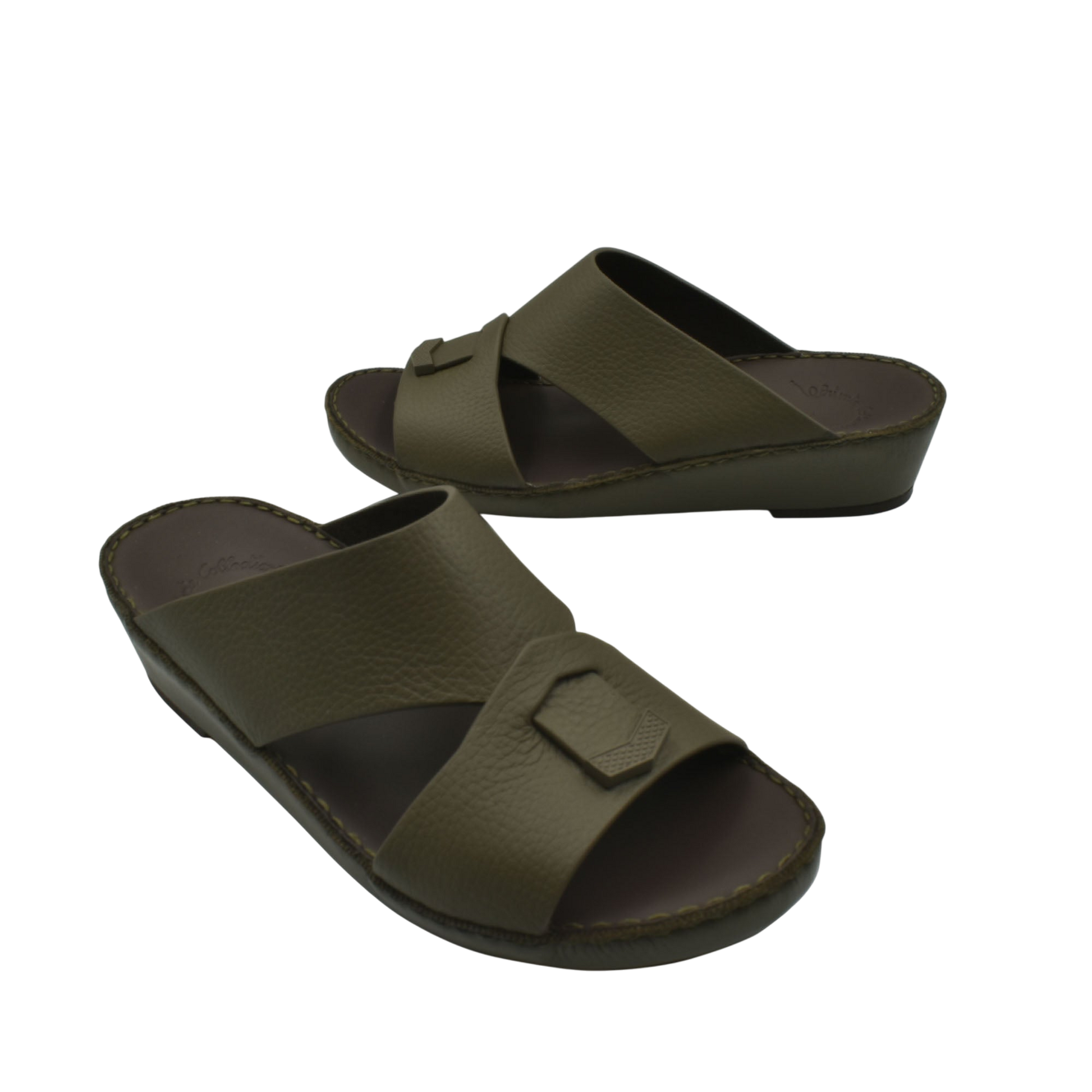 Trendy leather slide sandals in olive green with cushioned sole and cross-strap design
