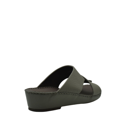 Olive green trendy leather slide sandals with cushioned sole and crisscross strap design