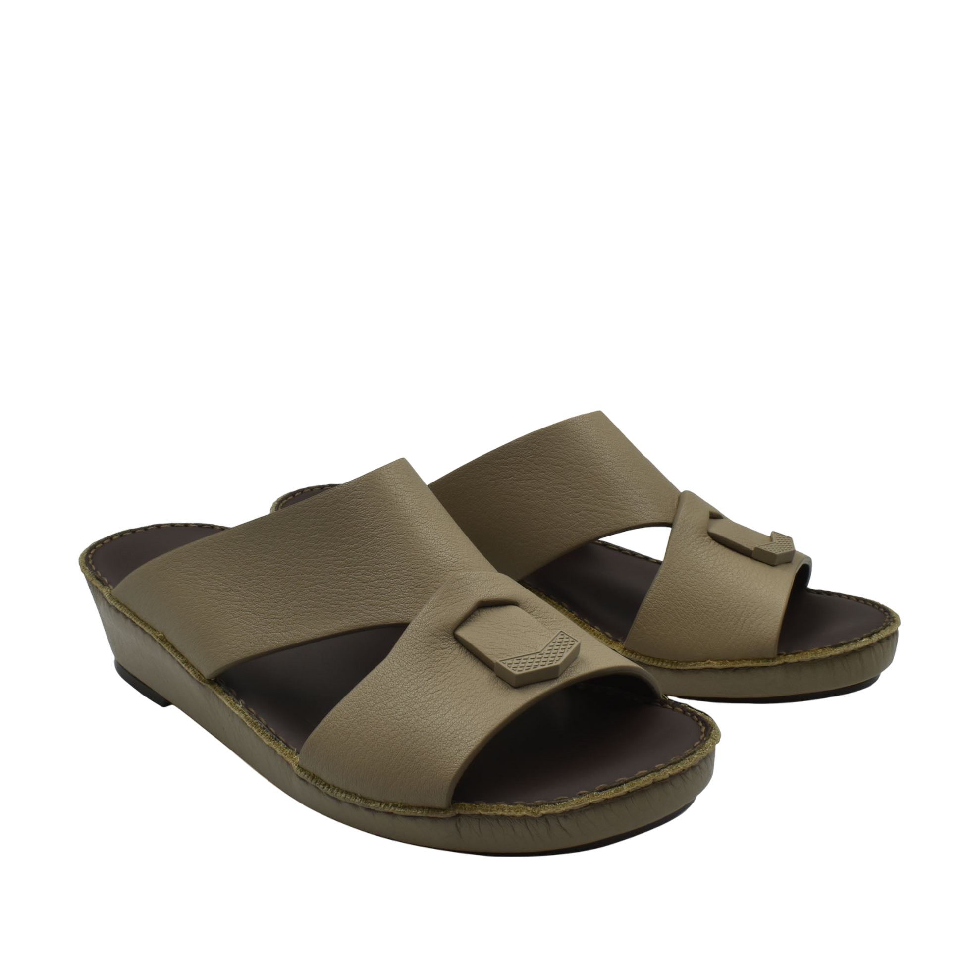 Trendy leather slide sandals in tan with wide straps and cushioned footbed for comfortable wear
