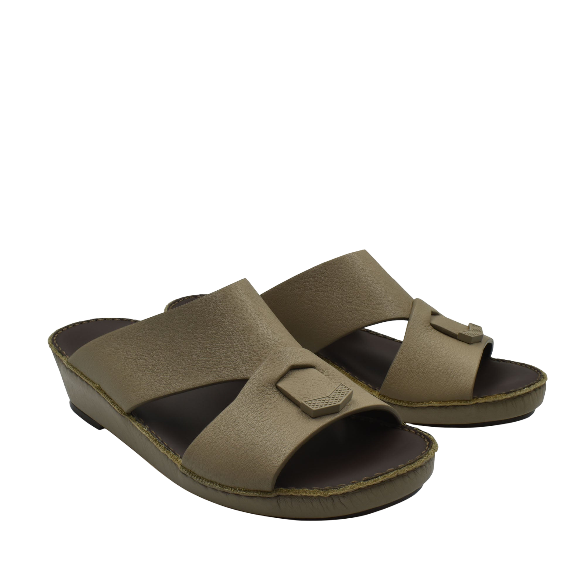 Trendy leather slide sandals in tan with wide straps and cushioned footbed for comfortable wear