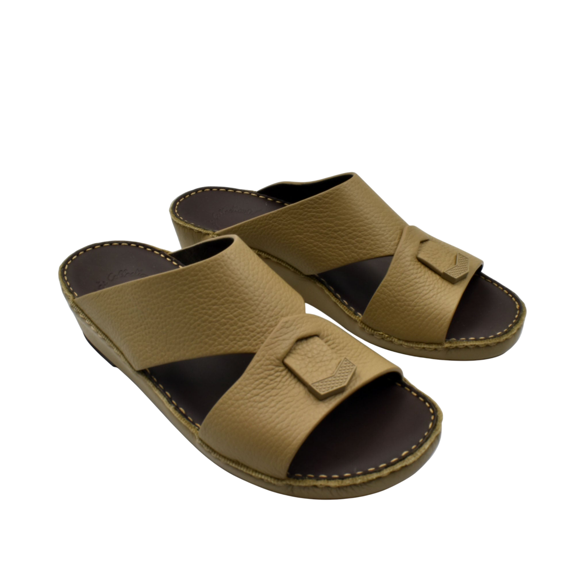 Trendy leather slide sandals in tan with wide straps and cushioned sole for comfortable wear