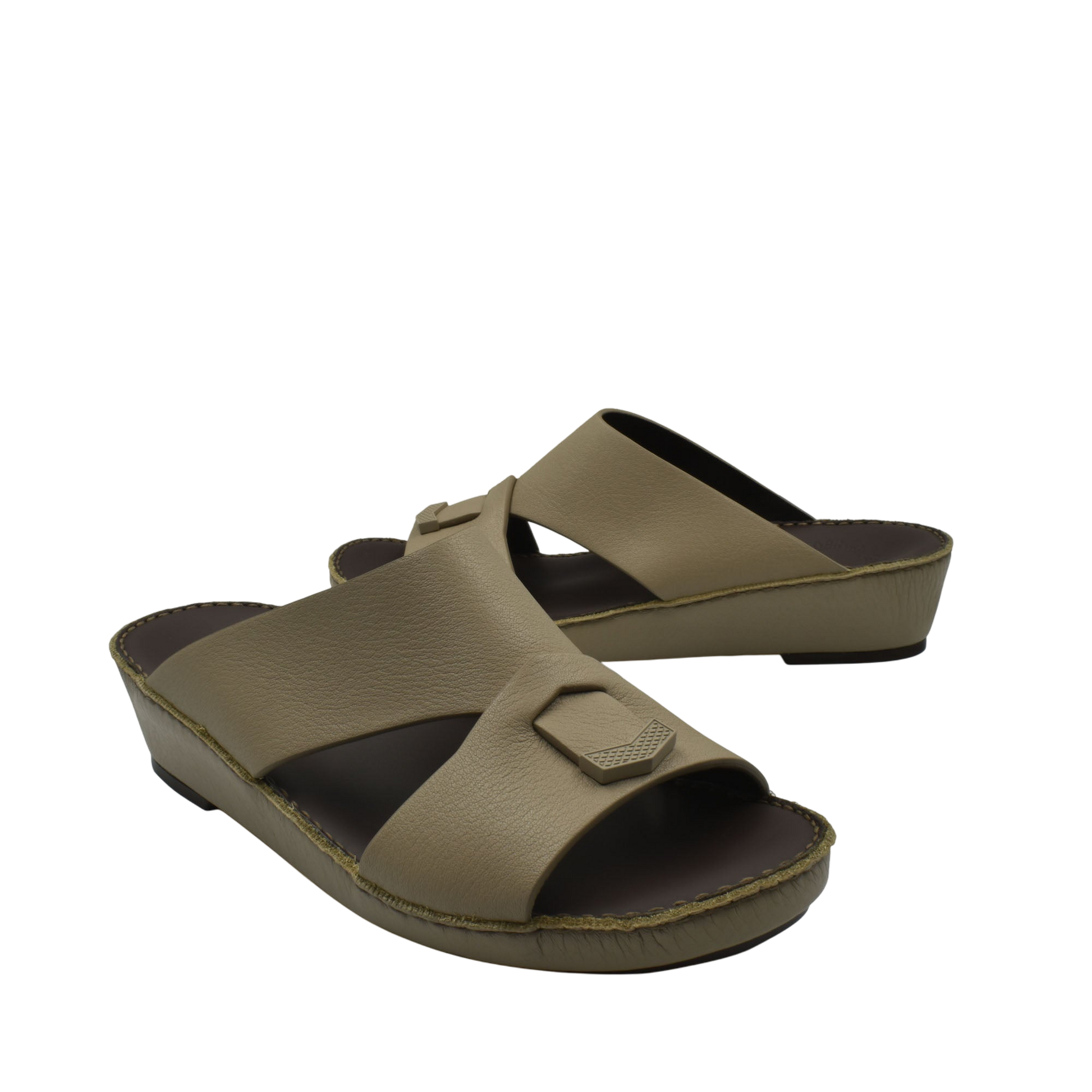 Trendy leather slide sandals in tan with wide cross straps and low wedge sole from Private Collection