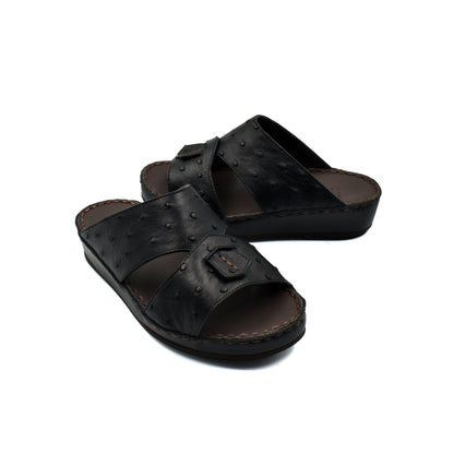 Black ostrich leather kids sandals with open toe and cushioned sole for comfort
