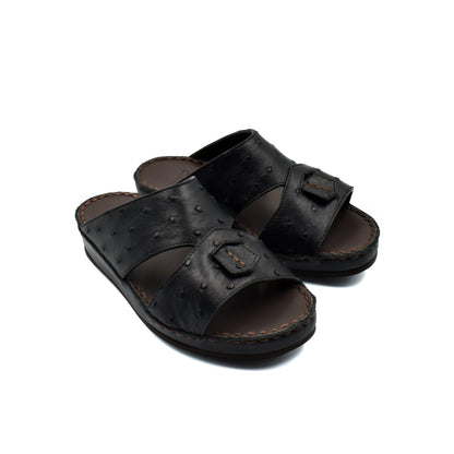 Black ostrich leather kids sandals with open toe and adjustable strap from private collection