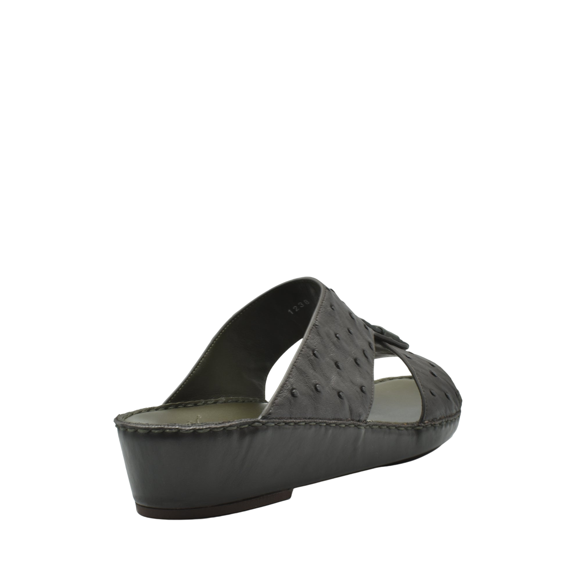 Black ostrich leather sandals with wedge heel and open toe design from Private Collection