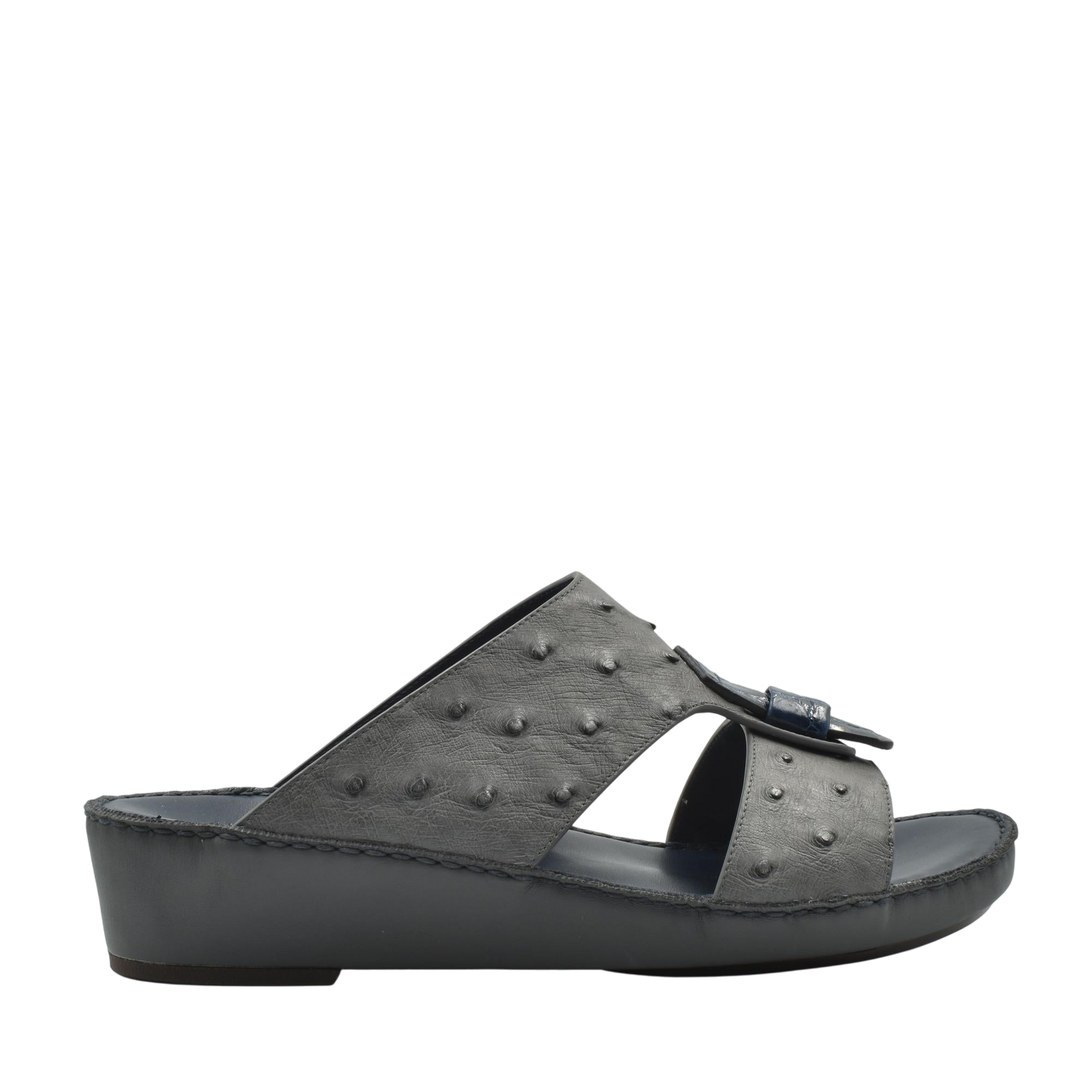 Black ostrich leather sandals with wedge sole and textured leather upper from Private collection