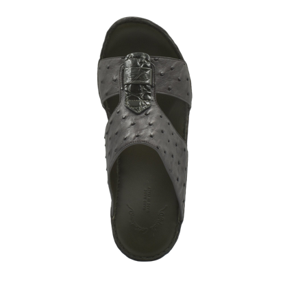 Black ostrich leather sandals with textured upper and open toe design from Private collection