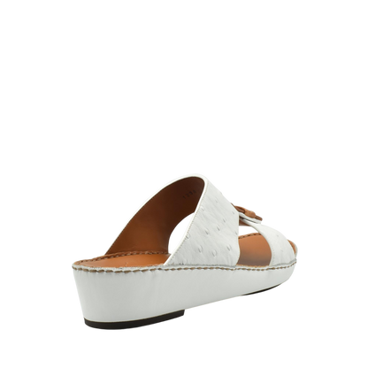 White ostrich leather sandals with open toe and cushioned sole from Private collection