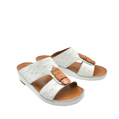 White and brown ostrich leather sandals with adjustable straps and cushioned soles