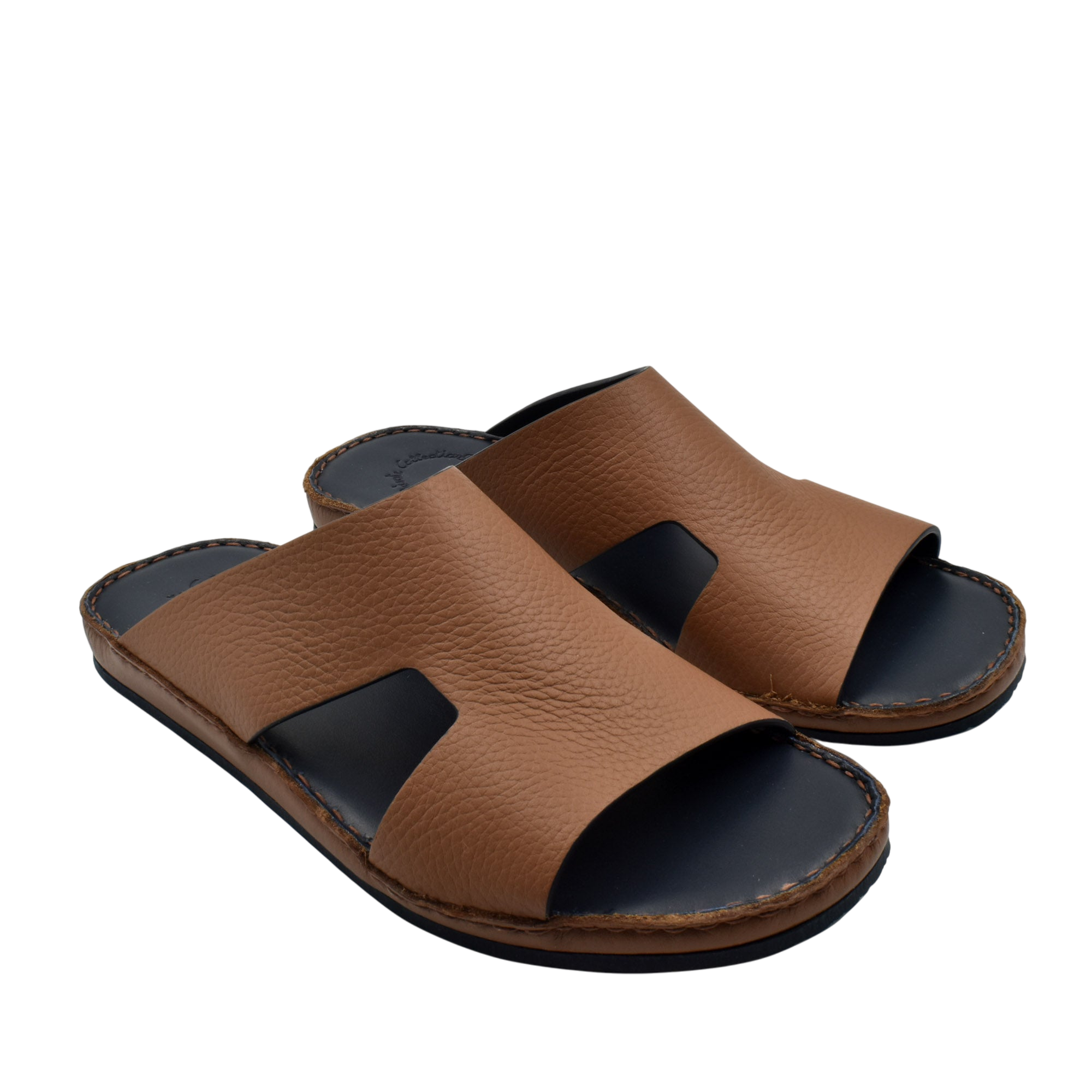 Brown Western leather sandals with open toe and black cushioned sole for comfortable wear