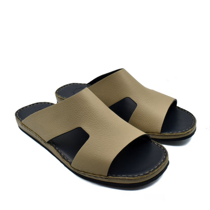 Beige and black Private Collection western leather sandals with open toe and slip-on design