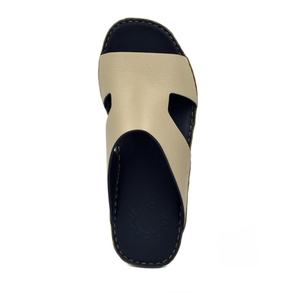 Top view of beige and black Western leather sandals with stitched sole from Private Collection
