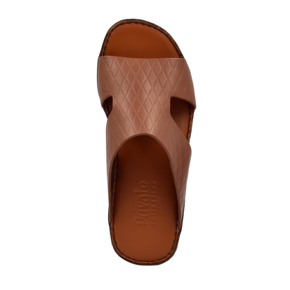Brown Western style leather sandals with textured straps and cushioned footbed from Private Collection