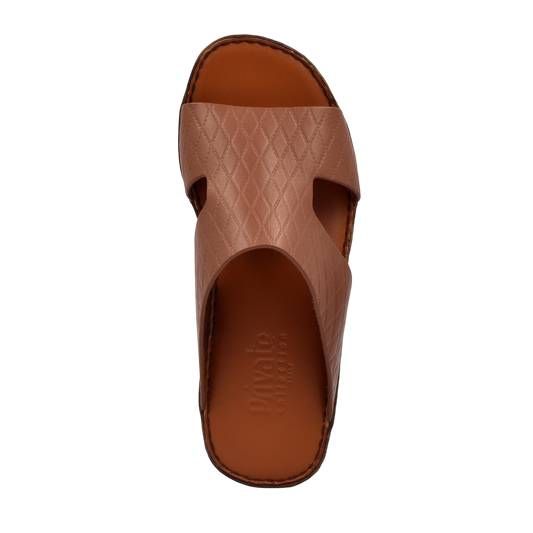 Brown Western style leather sandals with textured straps and cushioned footbed from Private Collection
