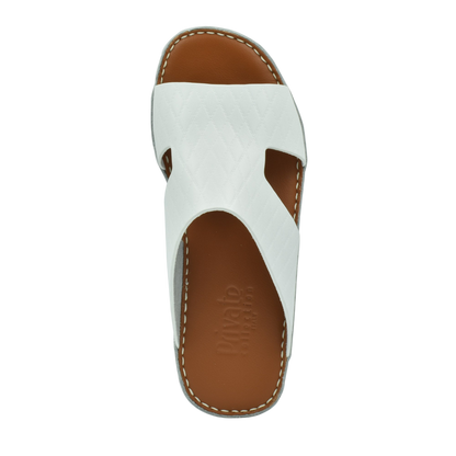 White Western style leather sandals with brown footbed and stitched detailing from Private Collection